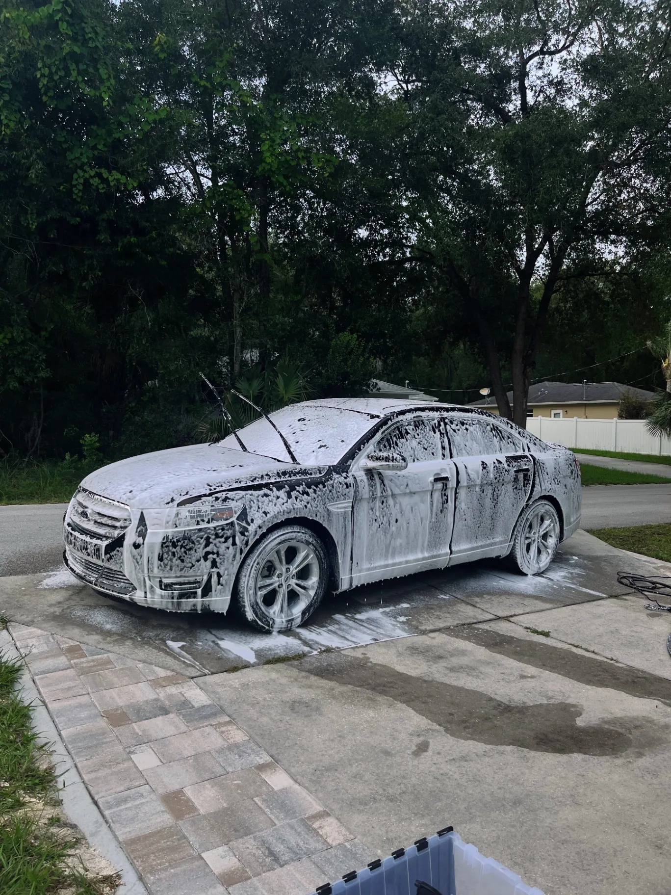 Sedan foam bath during premium exterior wash in Inverness, FL